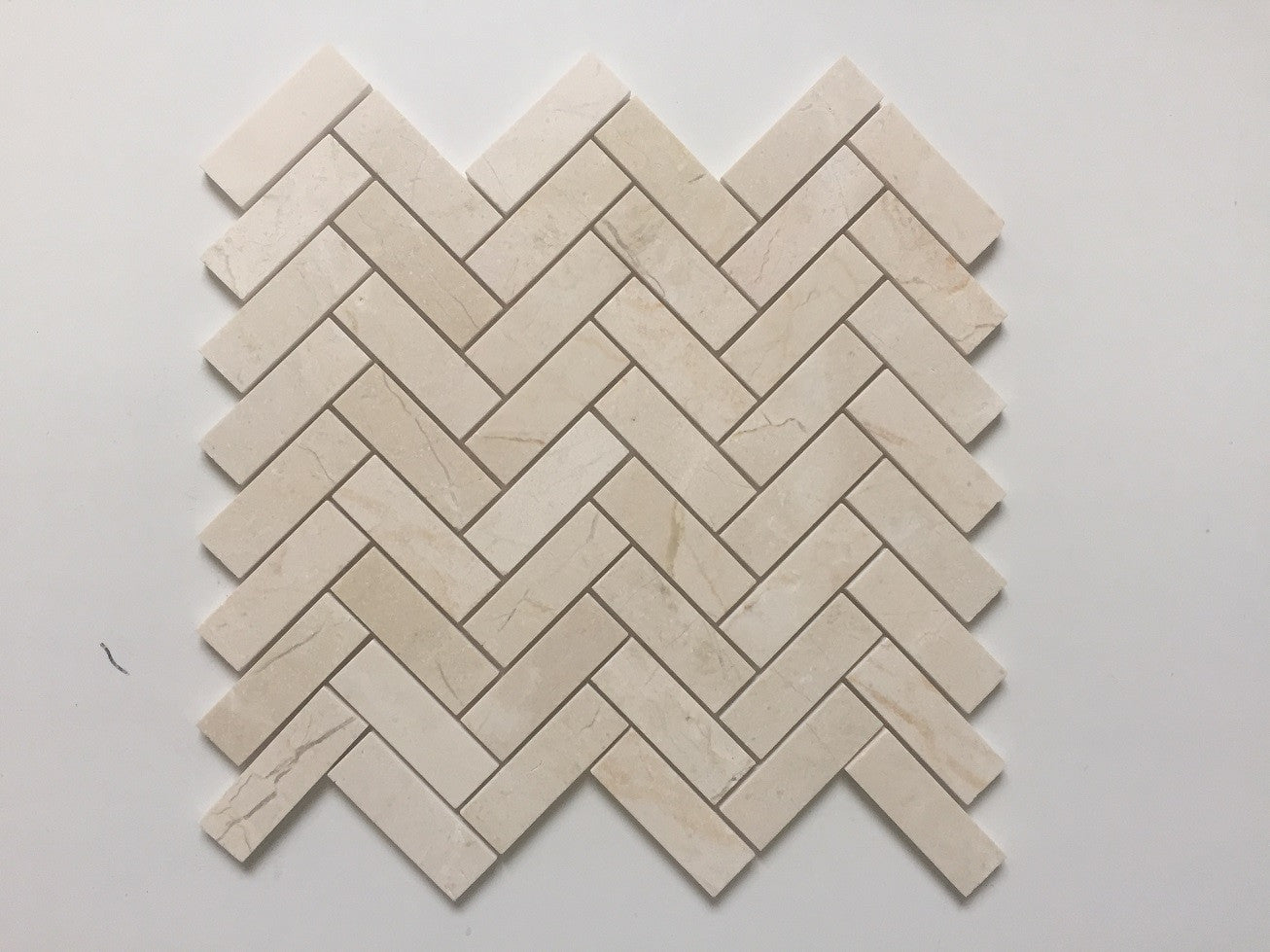 Procida Tile- Crema Marfil Herringbone 1"x3" Polished